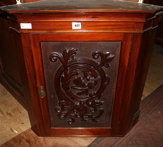 Carved corner cupboard